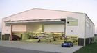Porcellana Hangar per aerei d&#039;acciaio prefabbricati su misura con il risparmio di lavoro fabbrica