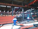 Porcellana Tettoia strutturale d&#039;acciaio agricola curva delle costruzioni del tetto del pannello a sandwich fabbrica